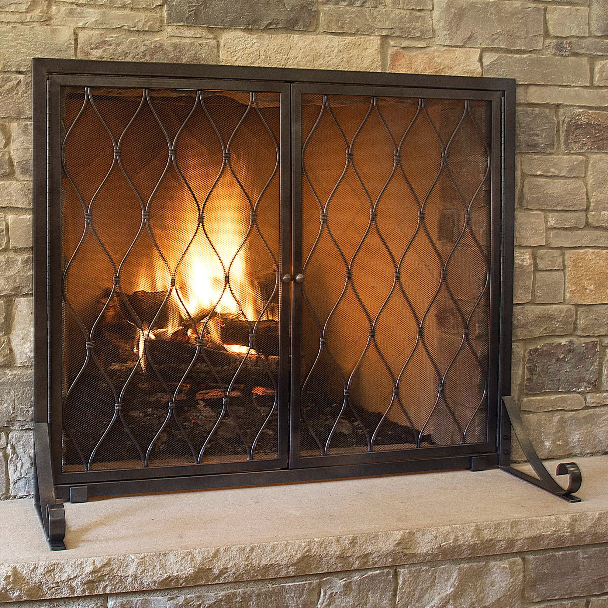 Fireplace screen or glass doors: which one your hearth needs