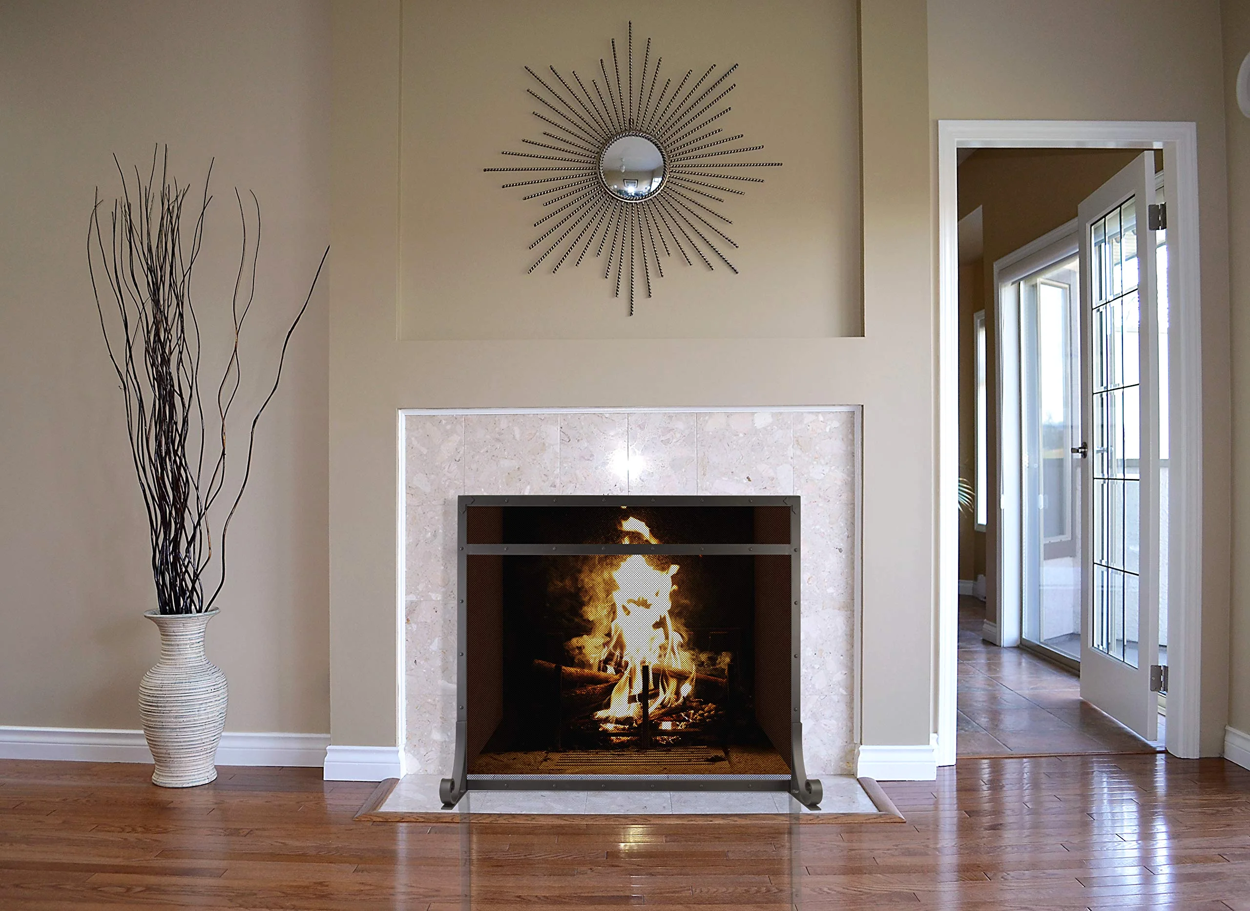 A Selene screen in front of an open fireplace